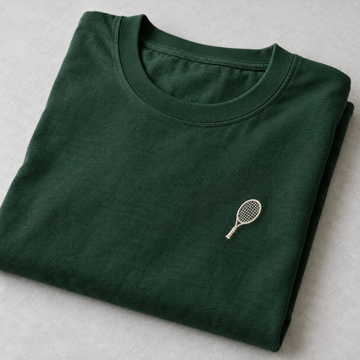 Forest tee with ivory racket embroidery · left chest